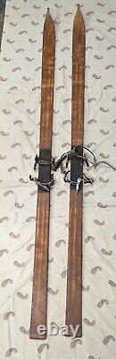 ANTIQUE SKIS vintage wood skies, leather toe & heel straps, early 20th century