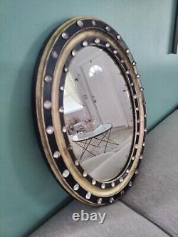 Antique Early 19th Century Irish Georgian Oval Ebonized And Gilt Wood Mirror