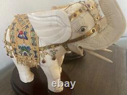 Early 20th century Chinese veneered carved elephant sculptures on wood base