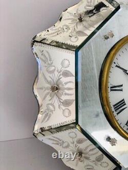 Horloge murale antique avec cadran en bois, décoration mécanique miroir, clé italienne Panadol rare du 20e siècle.