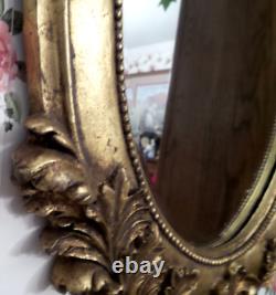 Miroir ovale vintage en gesso doré avec cupides 26x16