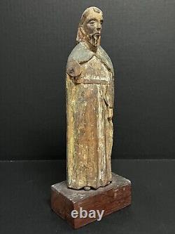 Saint polychrome en bois sculpté du début du XIXe siècle